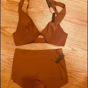 SKIMS brand new size XS both top and bottom for body sculpting.